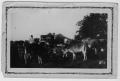 Photograph: [Two men with cattle]