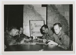 Primary view of [Four Men Sitting Around Table]