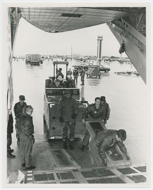 Primary view of object titled '[Men Around Aircraft Cargo Bay]'.