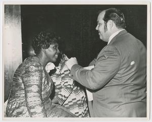 Primary view of object titled '[Barbara Jordan Speaking to Man]'.