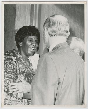 Primary view of object titled '[Barbara Jordan Laughing With Guests]'.