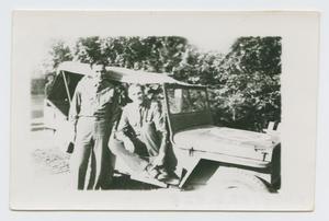 Primary view of object titled '[Two Soldiers and a Jeep]'.