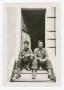 Photograph: [Soldiers Sitting on Stairs]
