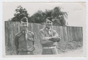 Primary view of object titled '[Chaplains by Fence]'.