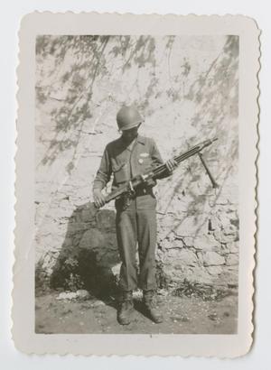 [Homer Petross Holding a Captured MG42]