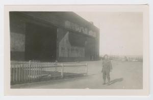 Primary view of object titled '[Laffal In Front of Hangar]'.