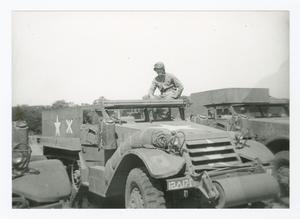 [Soldier Sitting on a Half-Track]