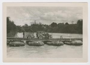 Primary view of object titled '[Jeep on Pontoon Bridge]'.