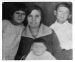 Photograph: [Nieves Colomo with three of her children]