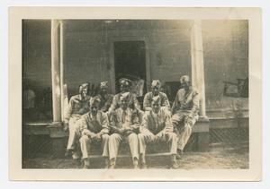 Primary view of object titled '[Soldiers Sitting on Steps]'.