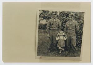 [Joe Lopez and Paul Velasco with a Young German Girl]