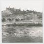 Photograph: [River View of Town Buildings]