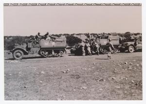 Primary view of object titled '[Vehicles in the Field]'.