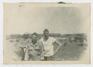 [Three Soldiers in a Field at Camp Campbell]