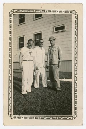 Primary view of object titled '[Susselman, Dan Melli, and Richard Johns by a Building]'.