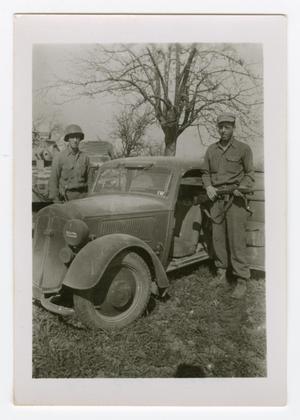[Michael Welsh and Leo Boettcher Standing with a Car]