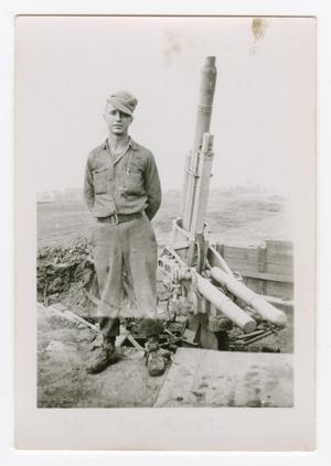 [W. B. Cummings with a German Antiaircraft Gun]