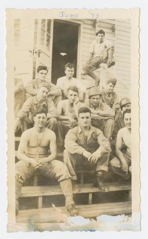 [Soldiers Sitting on Steps of Barracks]