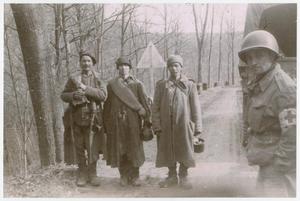 [Three Displaced Persons an a U.S. Soldier]