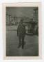 Photograph: [Walter Manley Standing in a Courtyard]