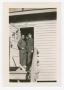 Photograph: [Crocker, Wilbur Berget, and Dobson Standing in a Barracks Doorway]