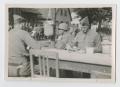 Photograph: [Soldiers at Courtyard Mess]