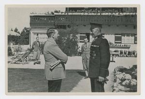 Primary view of object titled '[Adolf Hitler Talking to Officer]'.