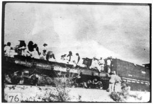 [Mexican refugees being loaded on trains]