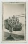 Thumbnail image of item number 1 in: '[Five Soldiers and a Dog on the Hood of a Scout Car]'.