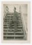 Photograph: [Morris Assyia Standing on a Stairway]