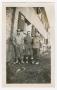 Photograph: [Three Soldiers Posing Outside of Furst Chateau]