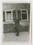 Thumbnail image of item number 1 in: '[Bill Taylor Beside a Building]'.
