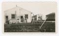Thumbnail image of item number 1 in: '[Soldiers Standing Around Buildings at Camp Campbell]'.