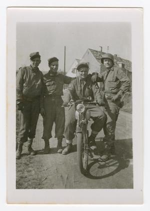 [Four Soldiers and a Motorcycle]