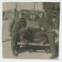 Photograph: [Soldiers Leaning on Jeep]