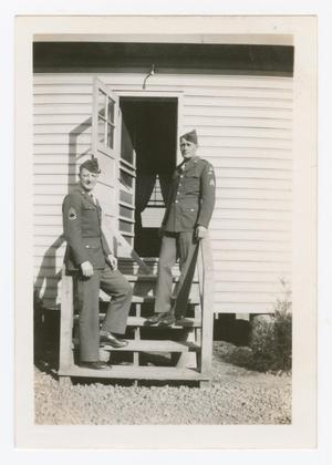 [Wilbur Berget and Clifford Onsrud Standing on a Barracks' Stairway]