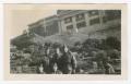 Photograph: [Five Posing Soldiers Below a Building]