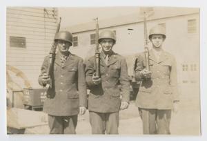 Primary view of object titled '[Three Soldiers Posing with Rifles]'.