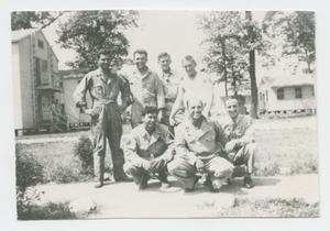 Primary view of object titled '[Photograph of Seven Men Posing at Camp Campbell]'.