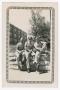 Thumbnail image of item number 1 in: '[Three Soldiers Sitting by Frisco Railroad Building]'.
