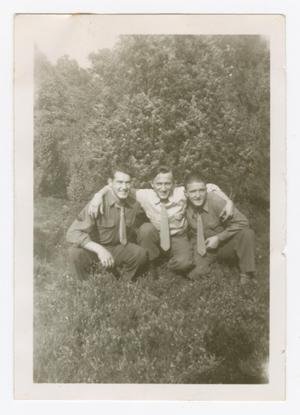 [Three Soldiers Crouching in Grass]
