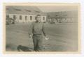 Photograph: [First Sergeant Charles O'Rourke in a Courtyard]