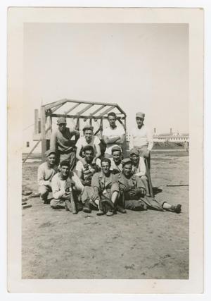 [Eleven Soldiers Posing with Baseball Equipment]