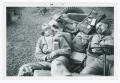 Photograph: [Soldiers Napping in a Jeep]