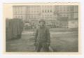 Photograph: [Technical Sergeant William Hawkins in Courtyard]