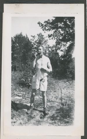 Primary view of object titled '[Shirtless Soldier Eating]'.