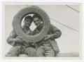 Primary view of [Marion and William Heiden Holding a Life Preserver]