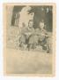 Thumbnail image of item number 1 in: '[Jewel Brekke and Clarence Oxford Seated on Steps]'.