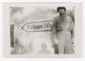 Thumbnail image of item number 1 in: '[Sergeant Standing by Sign Pointing to Dischingen, Germany]'.