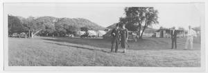 Primary view of object titled '[People Standing Near a Campground]'.